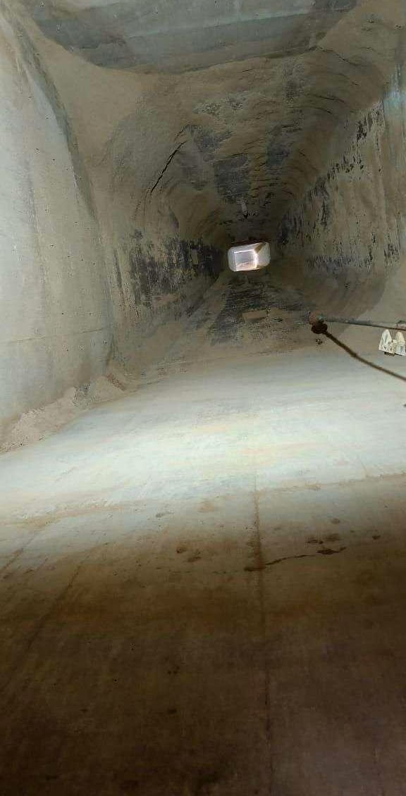 Ash hopper after Cardox India cleaning — outlet clear, walls cleaned back, free flow restored